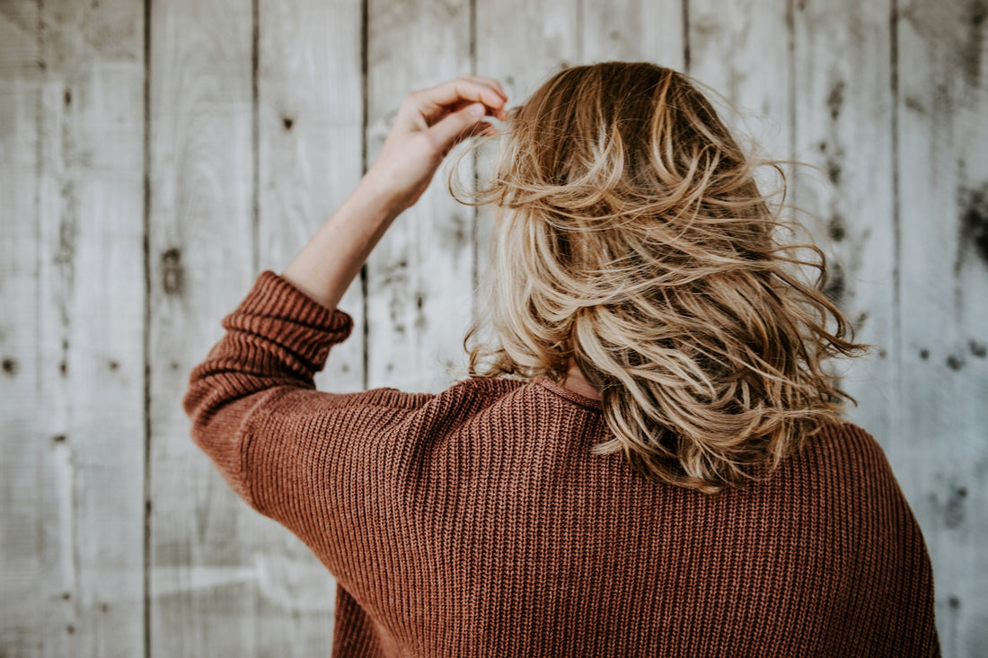 woman standing near board