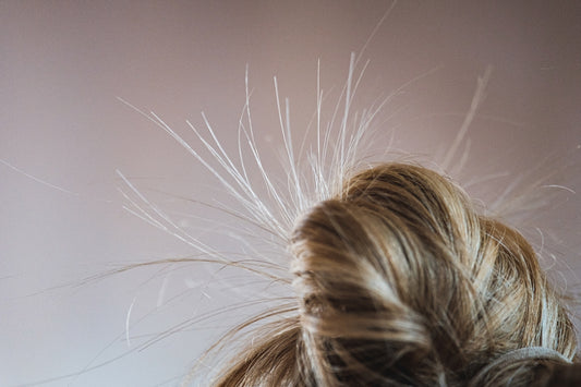 a close up of a woman's hair with long hair